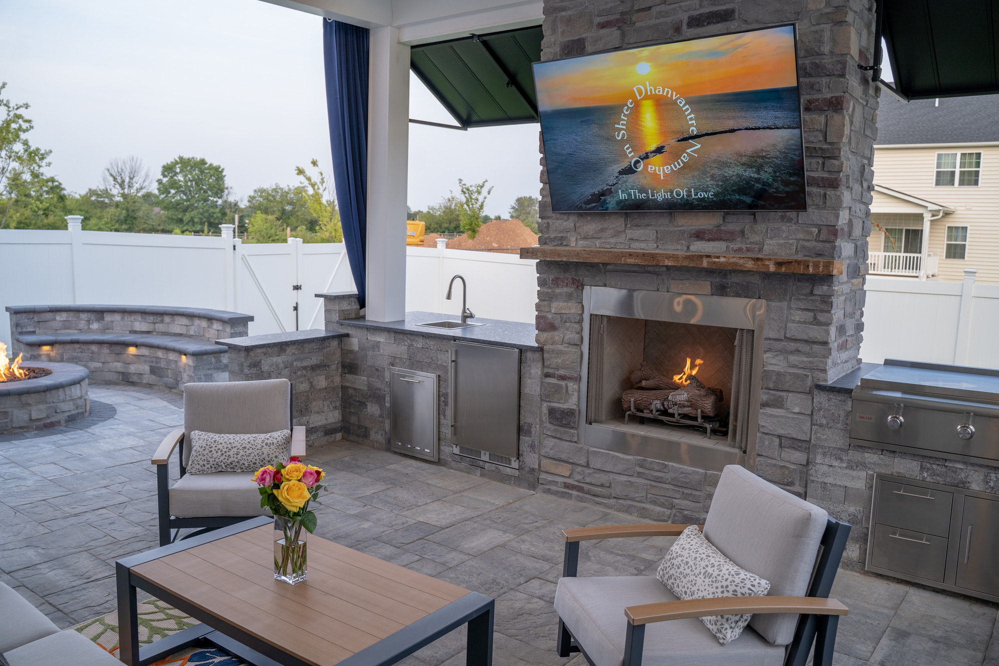 Outdoor Living Space with Fireplace and Kitchen